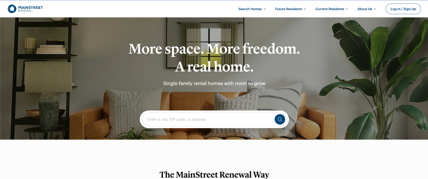 Launched MainStreet Renewal homepage: a furnished living room photograph behind the headline ‘More space. More freedom. A real home.’ and a single search field reading ‘Enter a city, ZIP code, or address’
